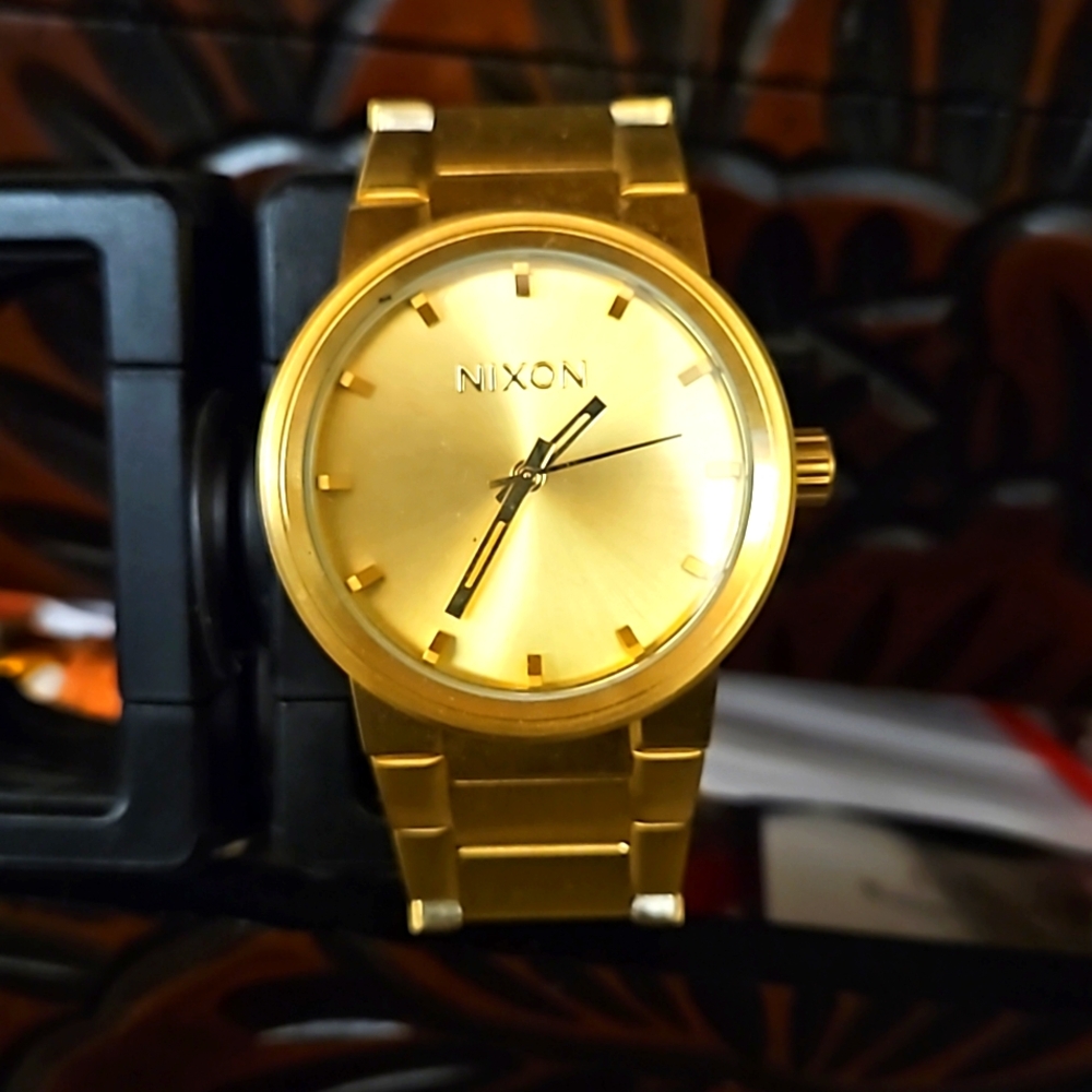 Gold Nixon watch